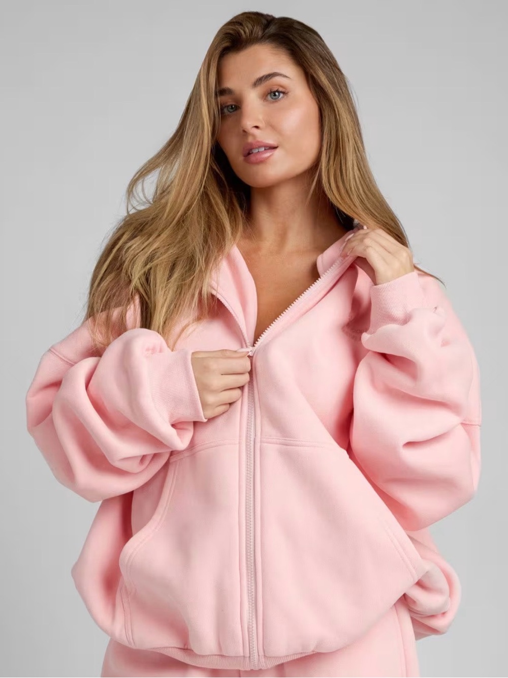 COMFRT LIMITED EDITION Oversized Front Zip Hoodie in the color BUBBLEGUM.